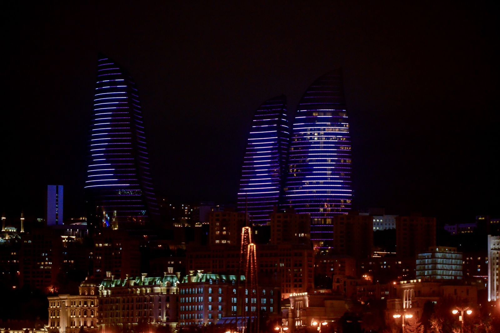 The logo of "Vugar Hashimov Memorial" is reflected in "Flame Towers" - PHOTO