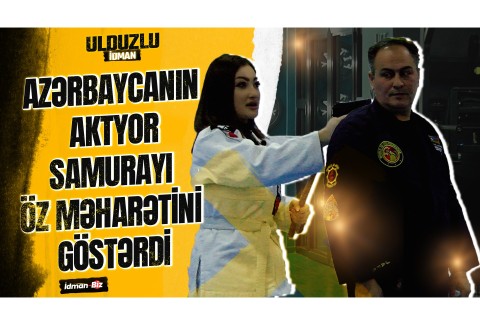 Азербайджанская ведущая наставила пистолет на самурая - ВИДЕО
