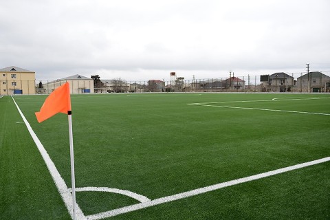 Binə stadionunun ot örtüyü yenilənib - FOTO