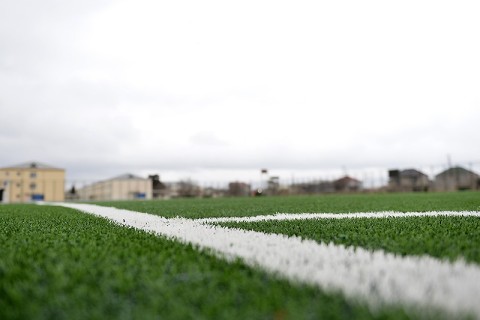 Binə stadionunun ot örtüyü yenilənib - FOTO