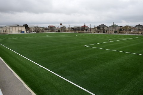 Binə stadionunun ot örtüyü yenilənib - FOTO