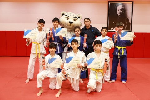 60 judokas take belt rank exams - PHOTO