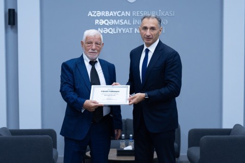 Rəşad Nəbiyev veteran cüdoçu Əhməddin Rəcəbli ilə görüşüb - FOTO