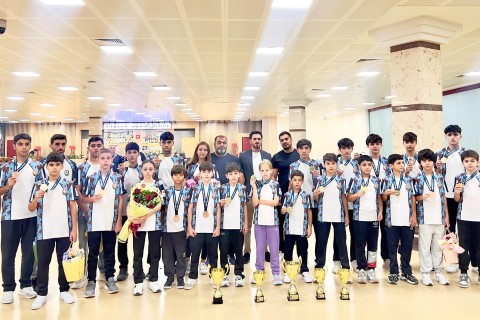 Rumıniyada yüksək nəticələr qazanan karateçilərimiz vətənə dönüb - FOTO