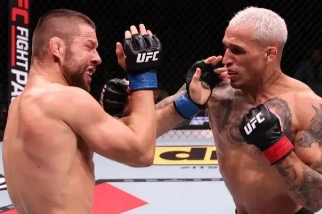 Rio-da dramatik UFC döyüşü: Çarlz Oliveyra boğucu fəndlə qalib gəldi - VİDEO