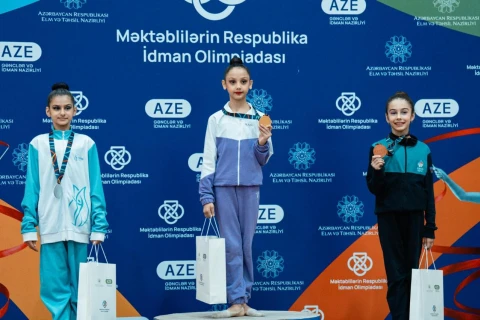 Məktəblilər arasında bədii gimnastika yarışları start götürüb