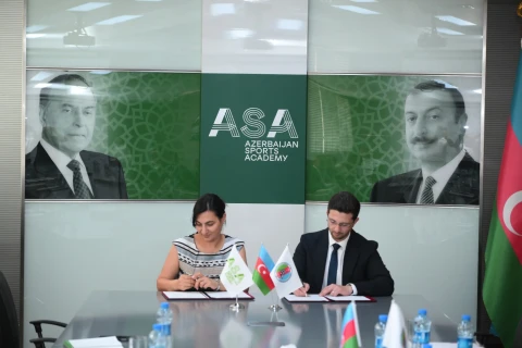 Azərbaycanın İdman Akademiyası və Güləş Federasiyası arasında əməkdaşlıq memorandumu imzalanıb  - FOTO